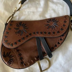 Dior Vintage laser cut saddle bag